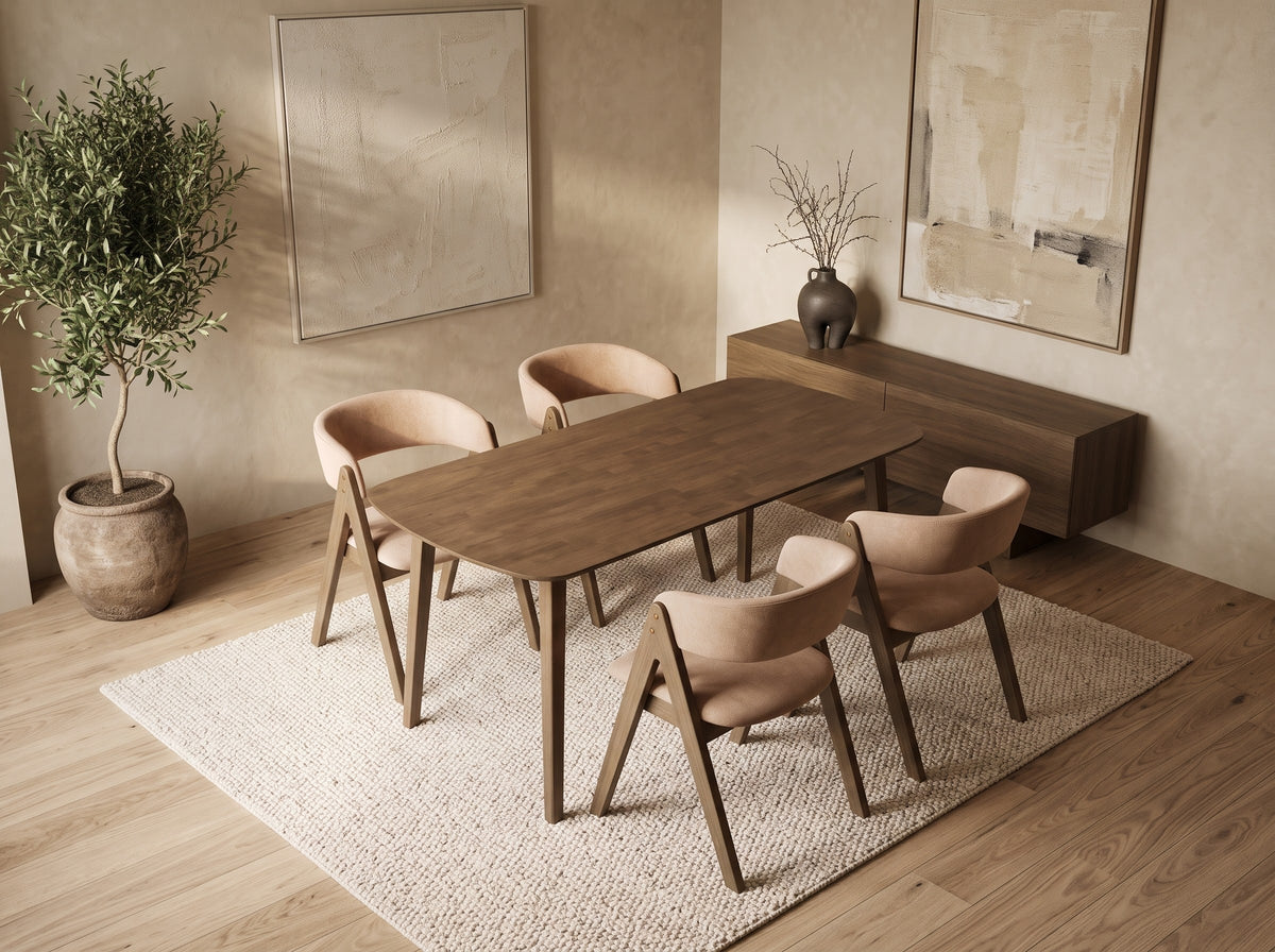 Overhead view of ELIO dining table and upholstered wood-framed chairs