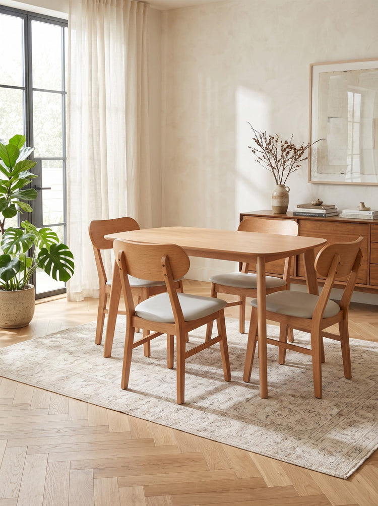 5-Piece Dining Set with warm wood table and four curved-back chairs featuring light upholstered seats and tapered legs