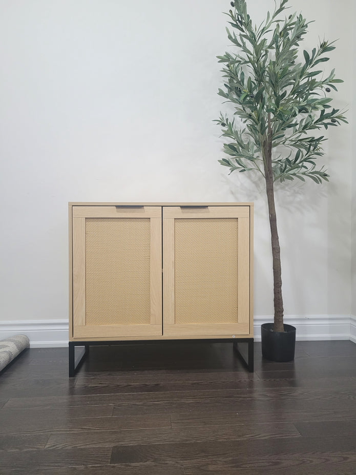 Oak accent storage cabinet with rattan doors and farmhouse rustic design