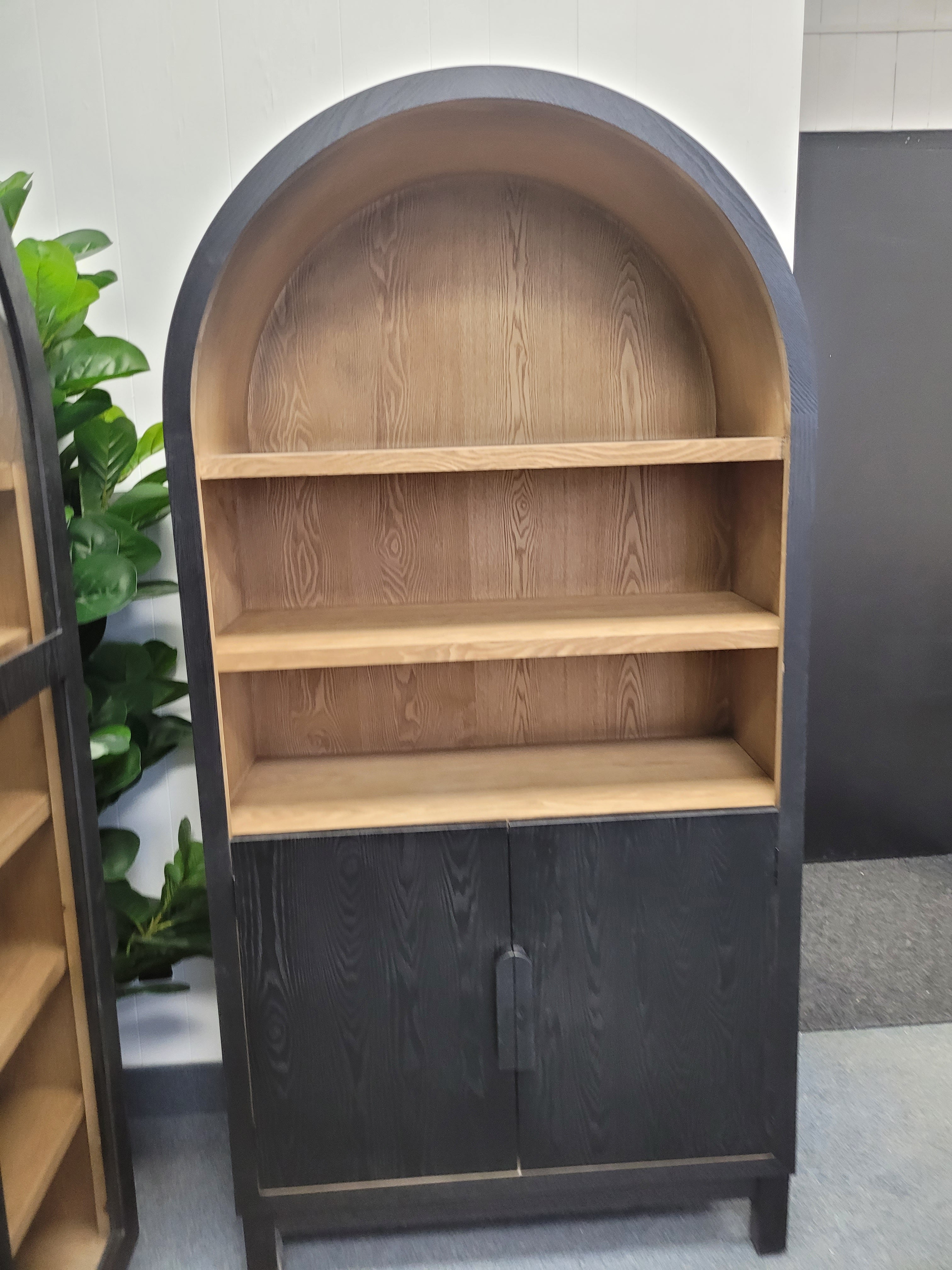 Arco Luxe Arch Cabinet in black finish with elegant arch design and four interior shelves for stylish home organization
