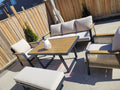 SNAKK SKITTENT Luxury Aluminum Dining Patio Set with teak wood accents and plush cushions in modern outdoor lounge setting