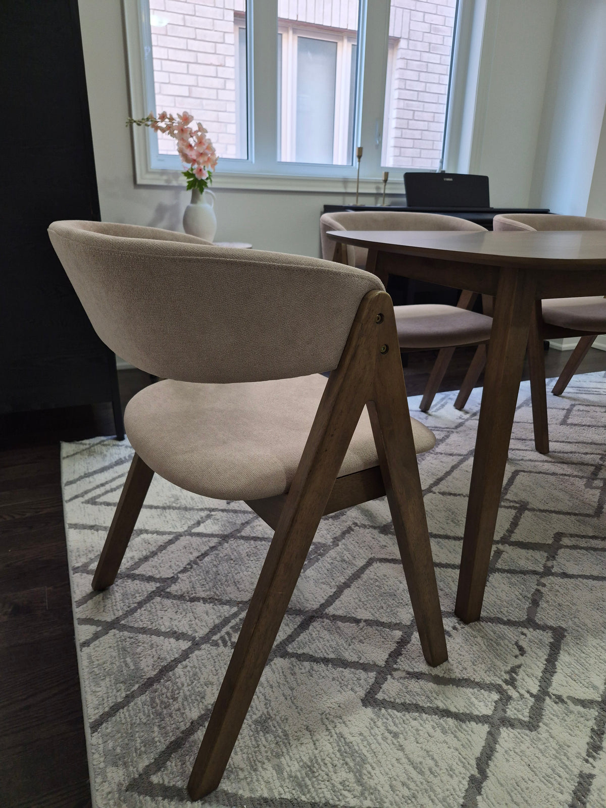 Rear view of ELIO fabric upholstered dining chair