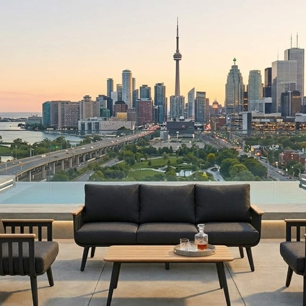 Modern 5-seater aluminum patio set with grey cushions and polywood coffee table on a deck