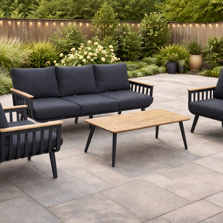 Modern 5-seater aluminum patio set with grey cushions and polywood coffee table in outdoor setting