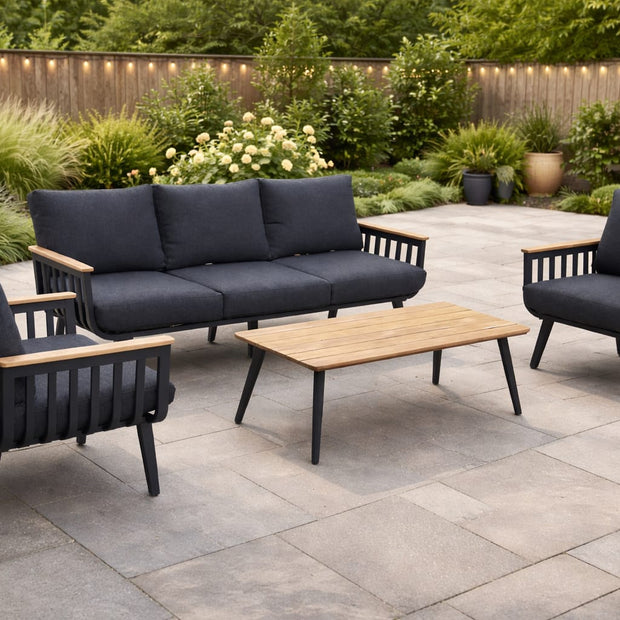 Modern 5-seater aluminum patio set with grey cushions and polywood coffee table in outdoor setting