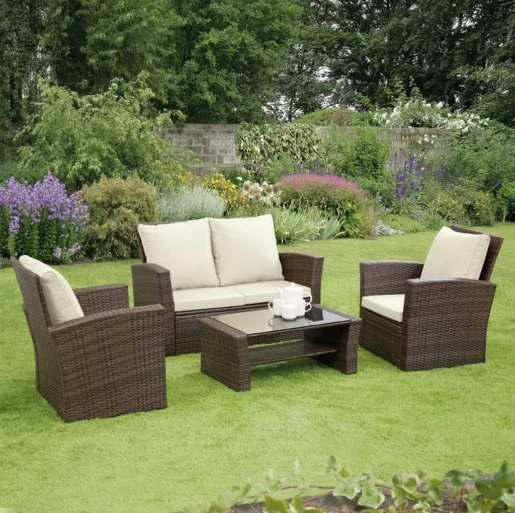4 PC rattan patio set with water-resistant foam cushions and removable covers for outdoor comfort