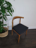 Chestnut Horn chair with PU leather cushion and solid rubberwood frame for durable, ergonomic seating