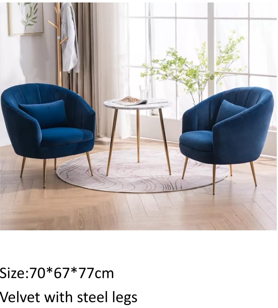 Two blue velvet AR Dynamic Accent Chairs with gold steel legs in a bright, modern living space