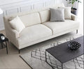 Contemporary style loveseat in beige with wooden legs and plush cushions in modern living room setting