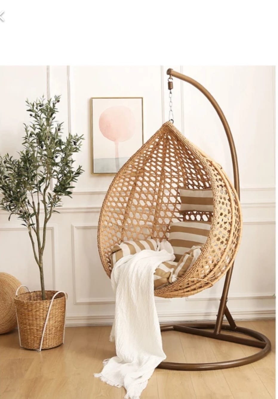 ARDYNAMIC AMARA light brown egg swing chair with hand-woven PE rattan, beige cushion, and durable iron stand for outdoor use
